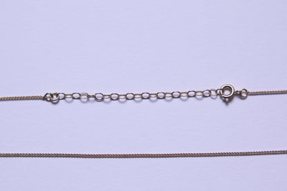 Chaine gourmette plaqué or