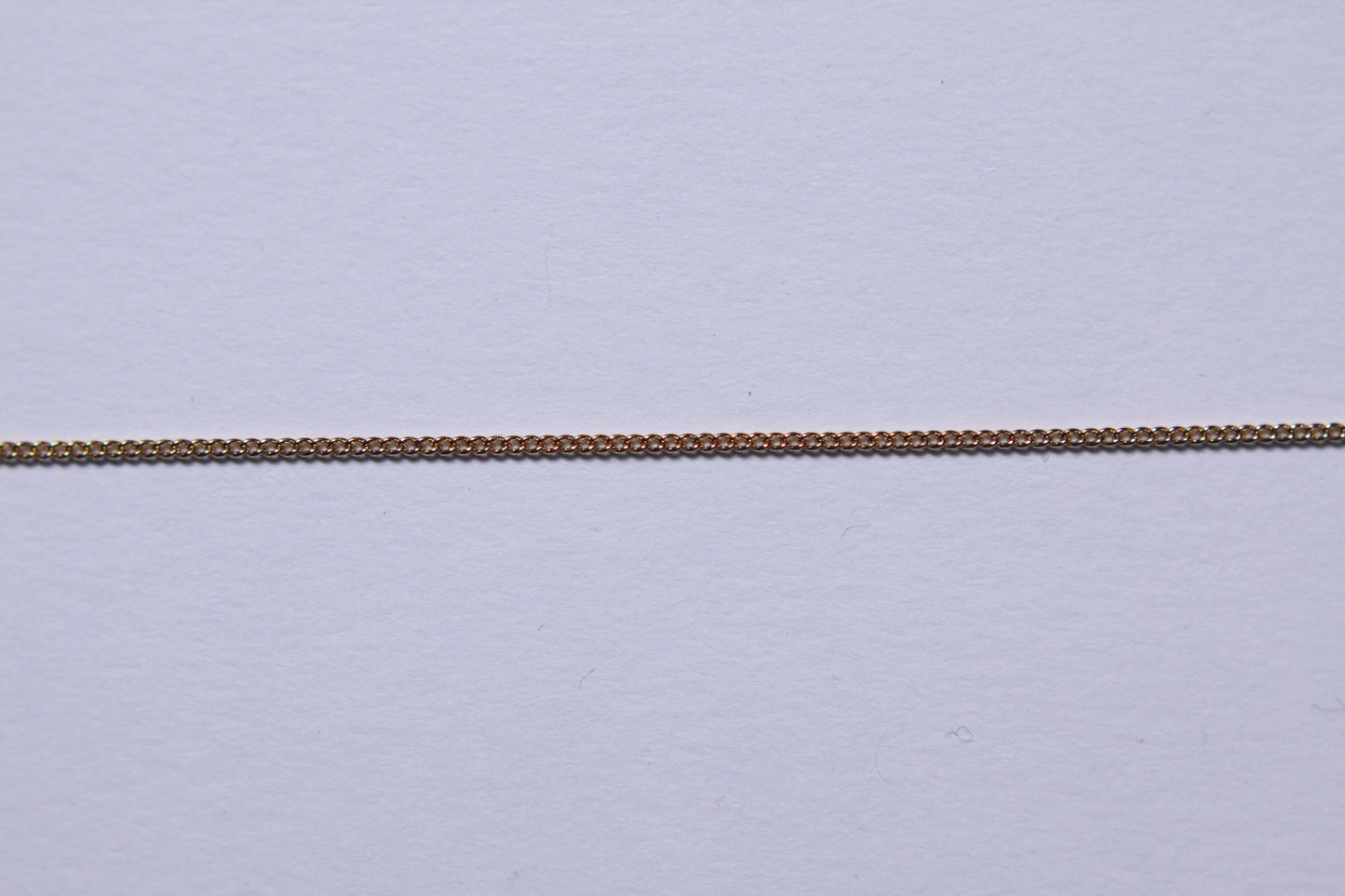 Chaine gourmette plaqué or