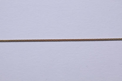 Chaine gourmette plaqué or