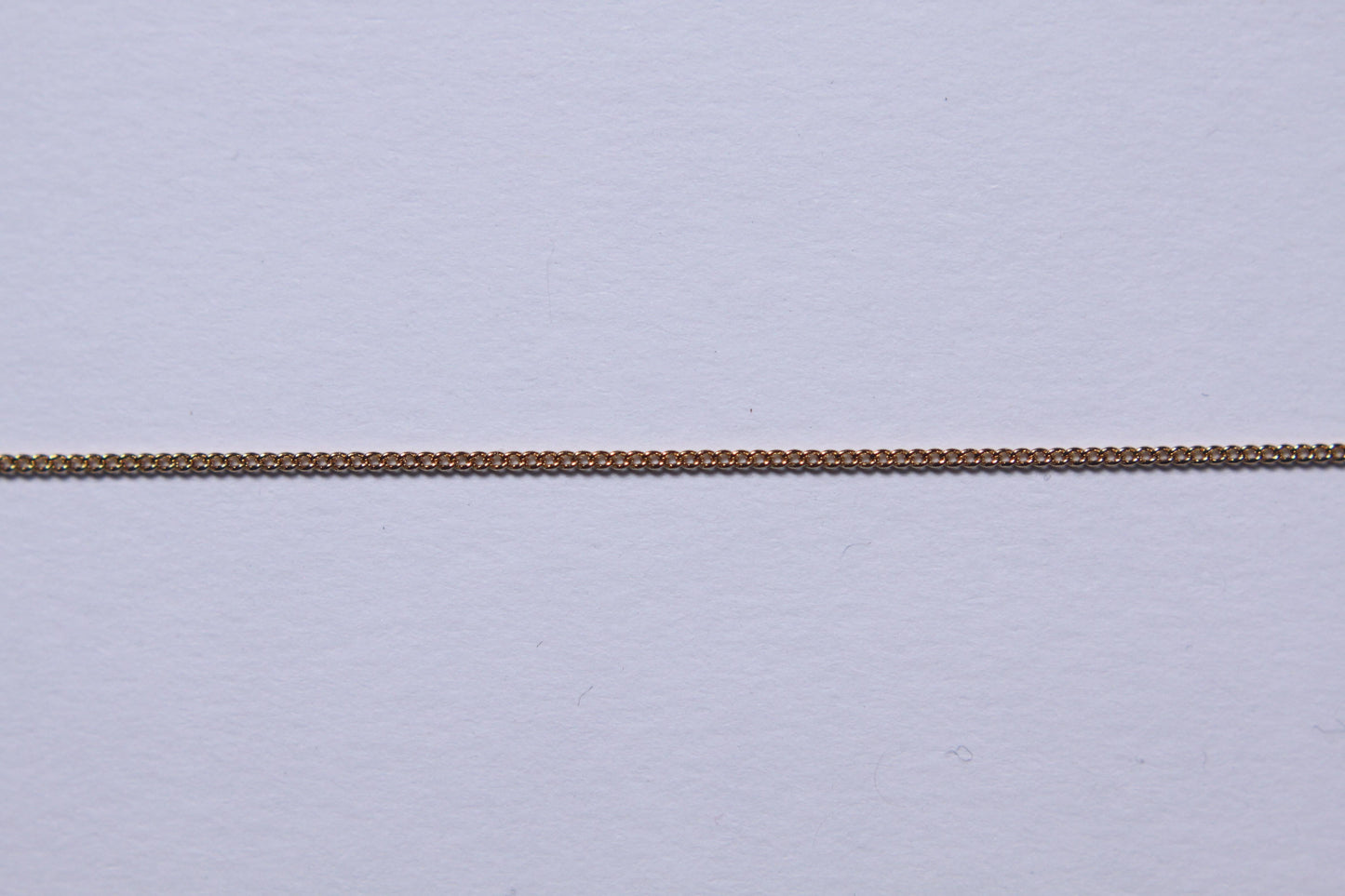 Chaine gourmette plaqué or