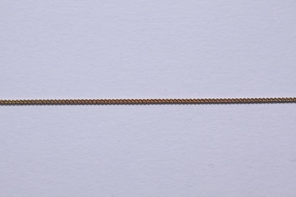 Chaine gourmette plaqué or