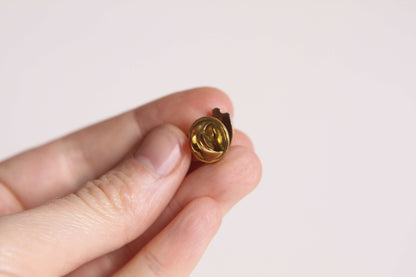 Pins Bras cassé