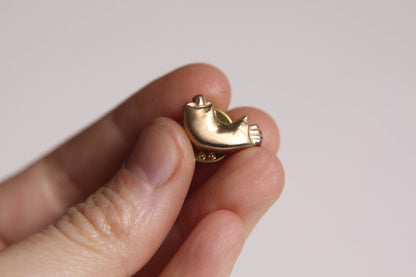 Pins Bras cassé