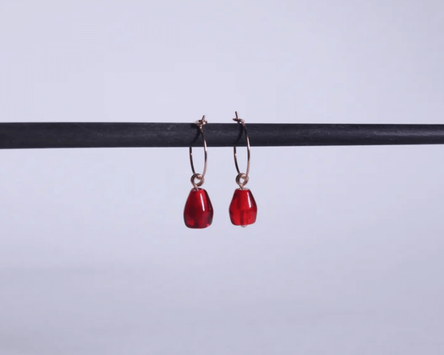 boucles d'oreilles représentant des graines de grenade