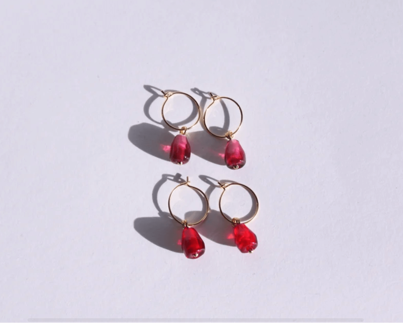 boucles d'oreilles en laiton en forme d'arilles de grenade