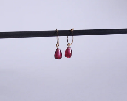 boucles d'oreilles en laiton symbolisant des graines de grenades