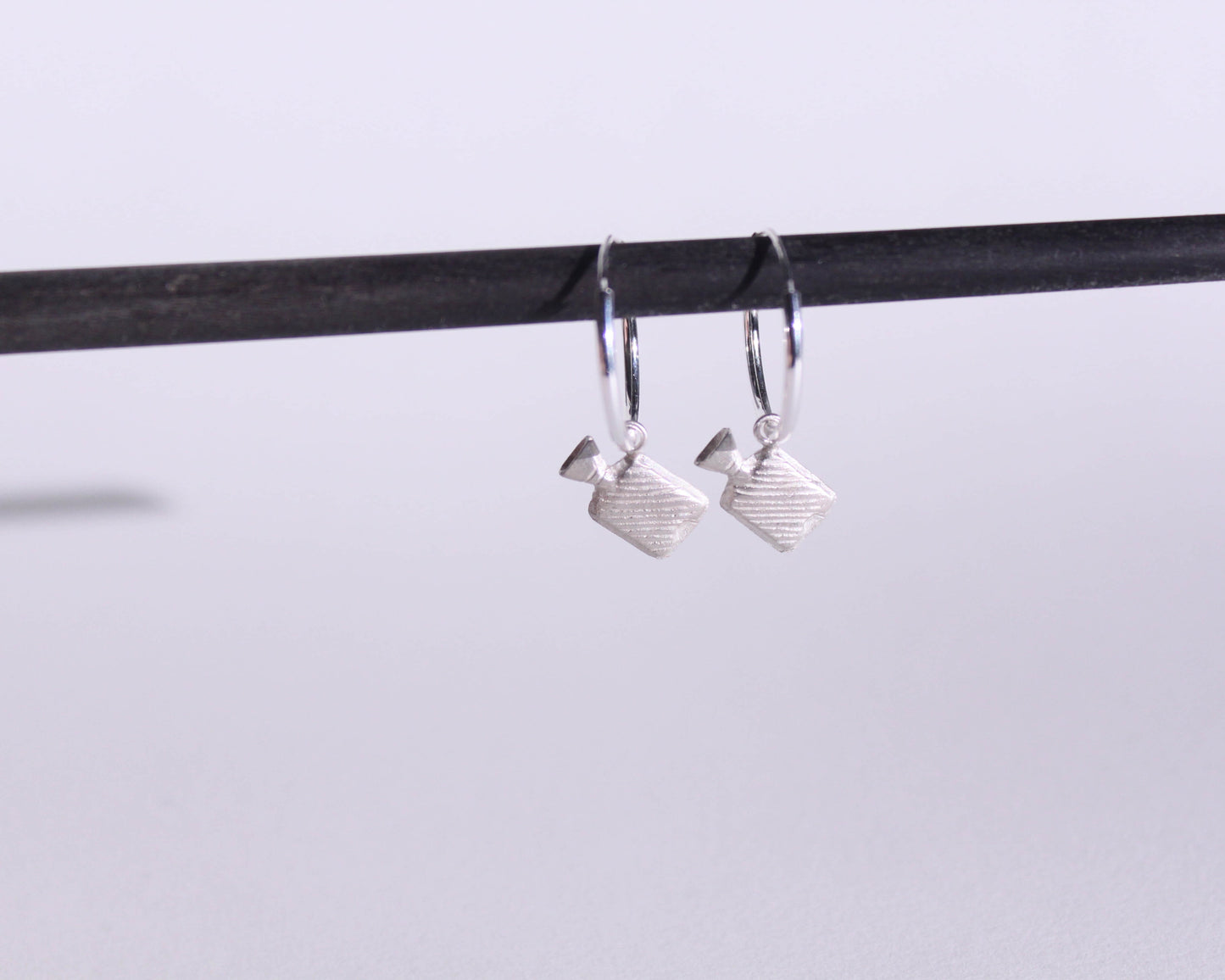 boucles d'oreilles en formes de bouillottes en argent massif