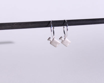 boucles d'oreilles en formes de bouillottes en argent massif