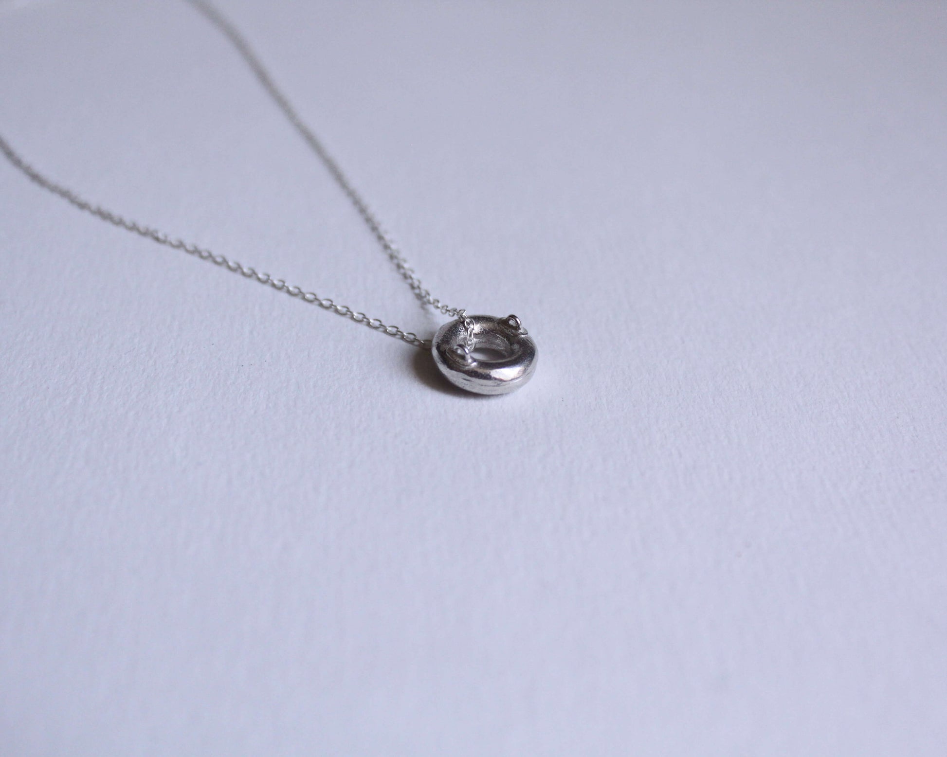 pendentif en argent massif en forme de bouée