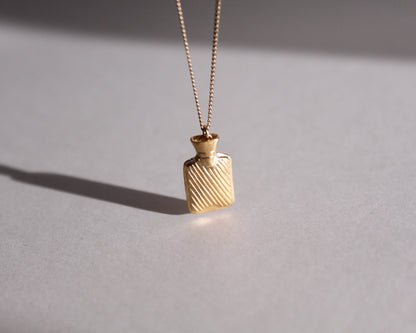pendentif en laiton plaqué or en forme de bouillotte