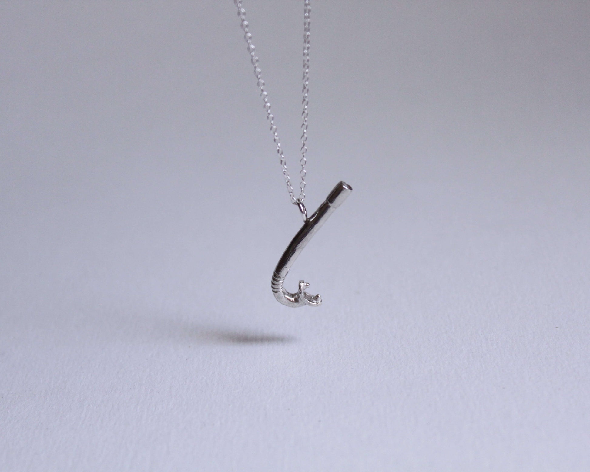 pendentif en argent massif en forme de tuba